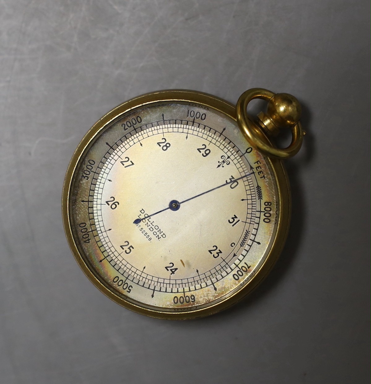 A cased Dolland pocket barometer